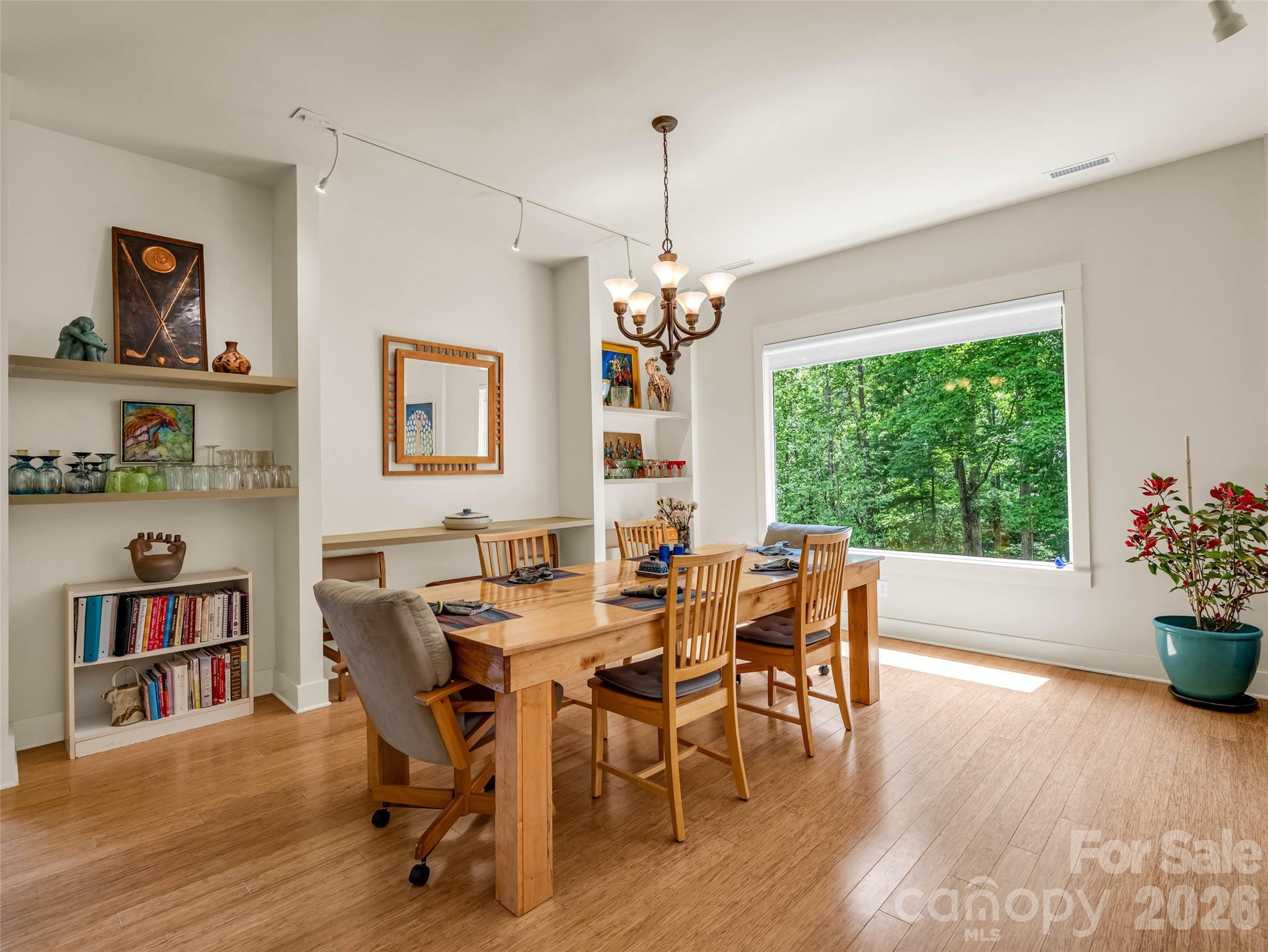 120 Glenn Court Mill Spring, NC 28756 - Photo 12 of 48 a dining room with furniture window wooden floor