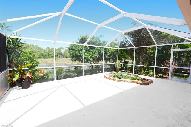 a view of a swimming pool with a garden