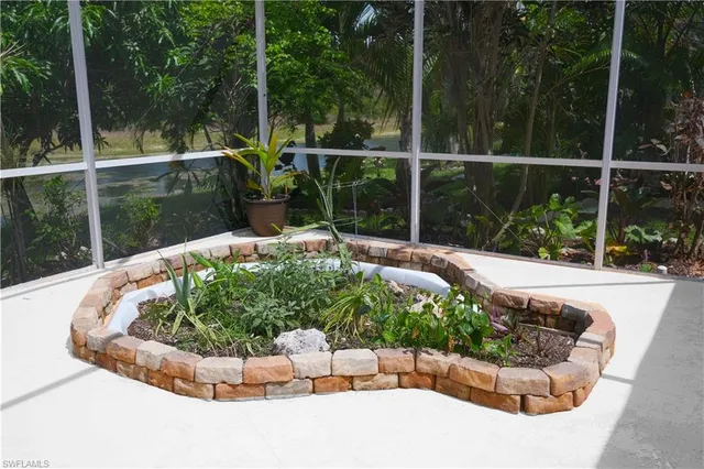 a view of a garden with a yard