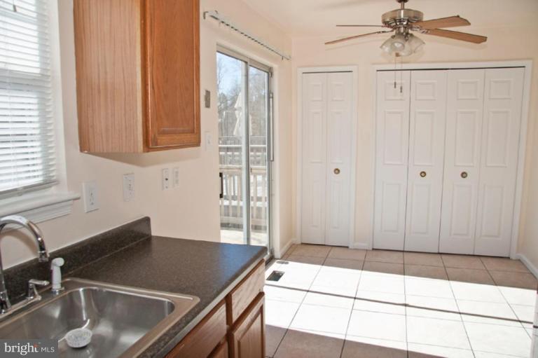 3515 Corn Stream Road Randallstown, MD 21133 - Photo 13 of 23 a kitchen with a sink and a window