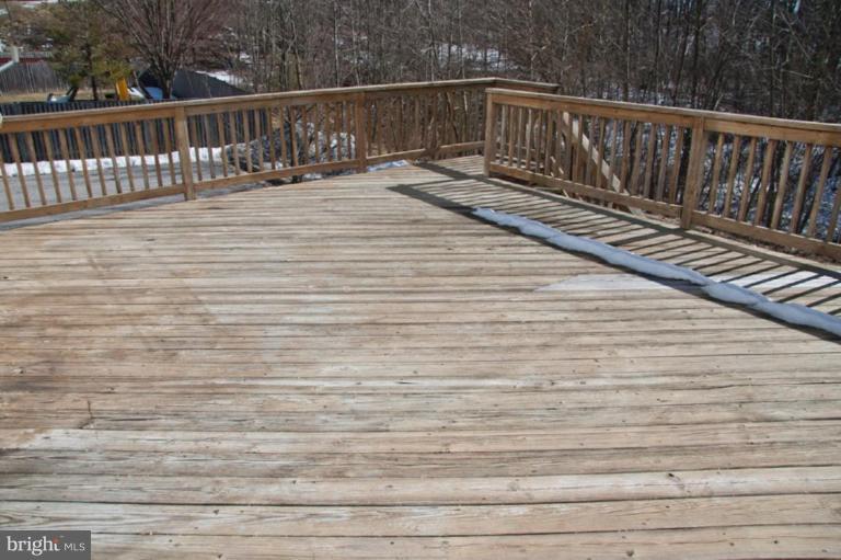 3515 Corn Stream Road Randallstown, MD 21133 - Photo 14 of 23 a view of deck with wooden floor and fence