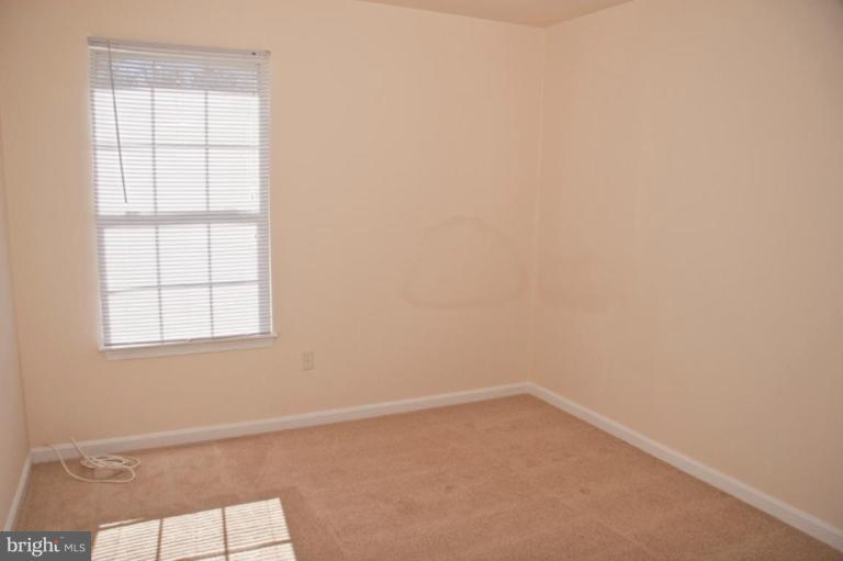 3515 Corn Stream Road Randallstown, MD 21133 - Photo 17 of 23 an empty room with a window