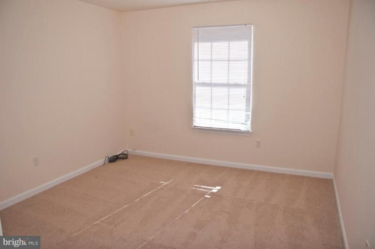 3515 Corn Stream Road Randallstown, MD 21133 - Photo 20 of 23 an empty room with a window