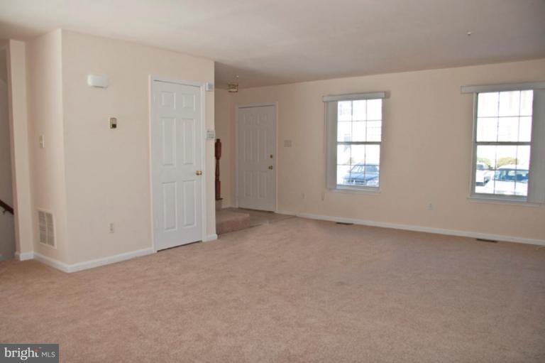 3515 Corn Stream Road Randallstown, MD 21133 - Photo 10 of 23 an empty room with windows