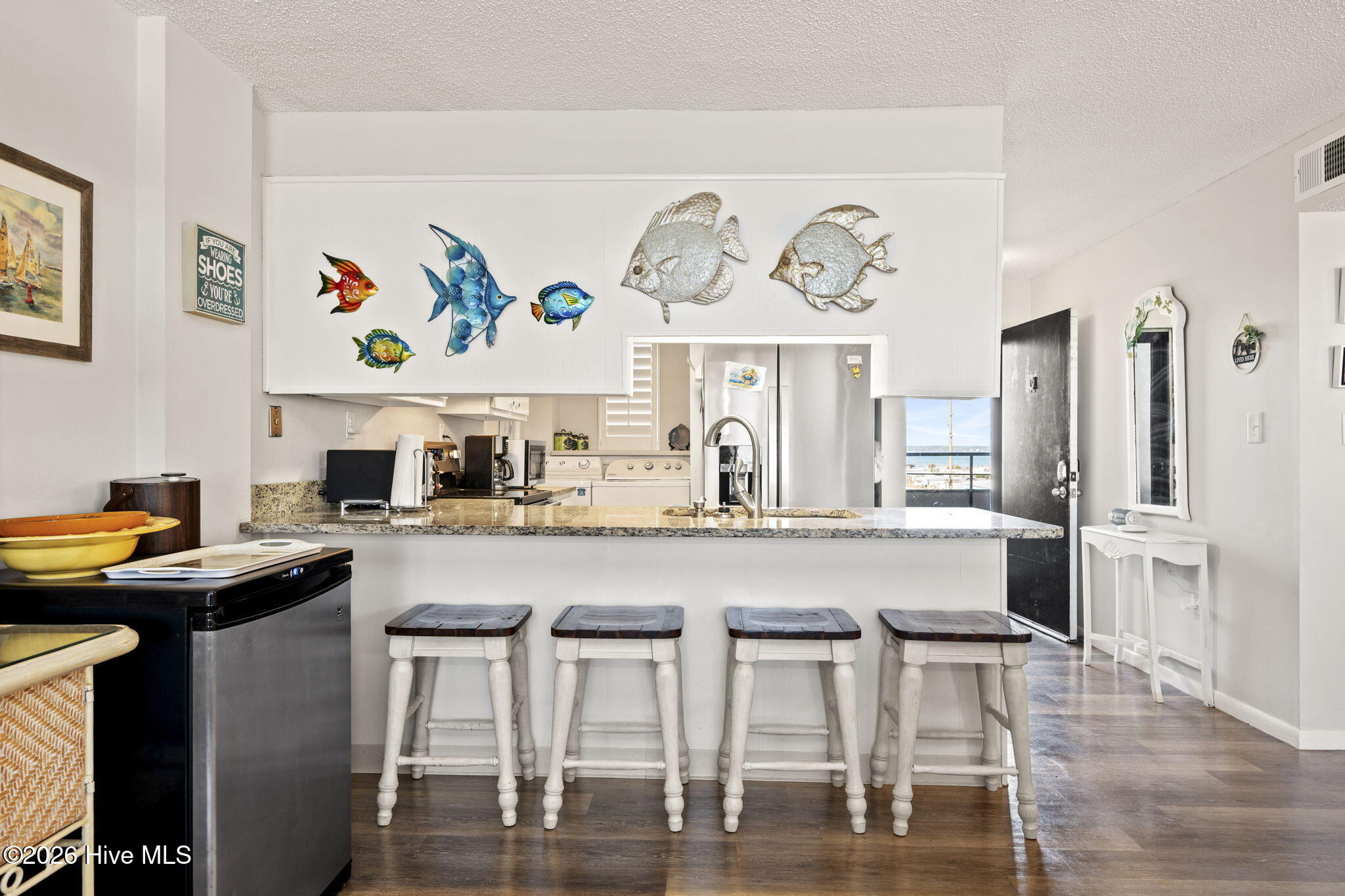 1505 Salter Path Road, Unit 412 Indian Beach, NC 28512 - Photo 12 of 55 Bar Area to Kitchen