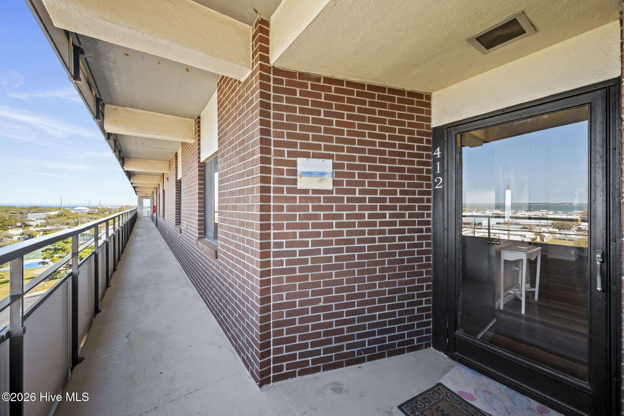 1505 Salter Path Road, Unit 412 Indian Beach, NC 28512 - Photo 33 of 55 Walkway to 412