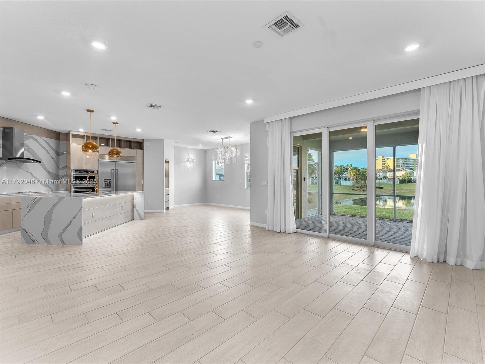 4317 Ficus Street Hollywood, FL 33021 - Photo 5 of 29 a view of a kitchen with large windows