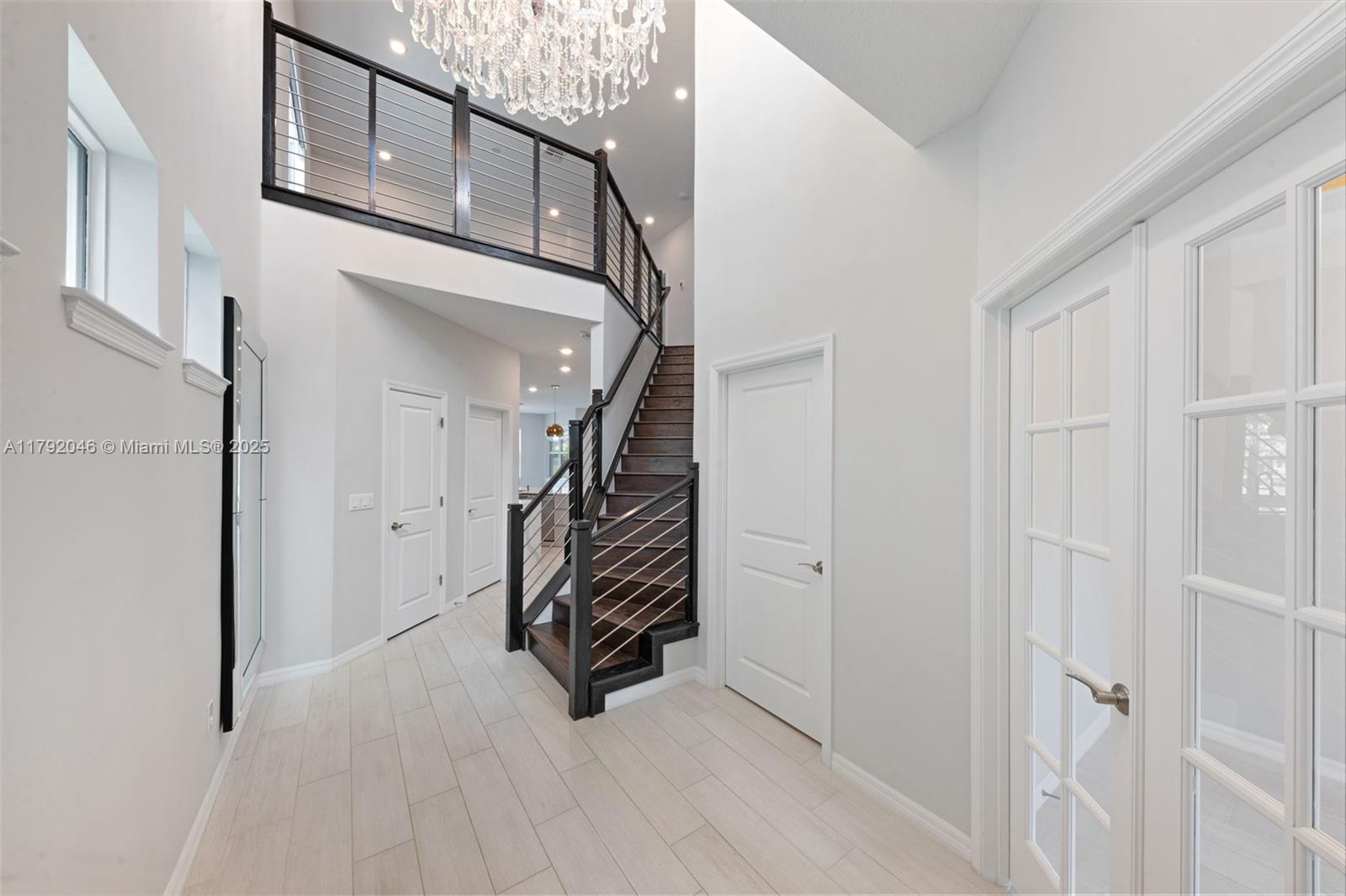 4317 Ficus Street Hollywood, FL 33021 - Photo 8 of 29 a view of entryway with stairs