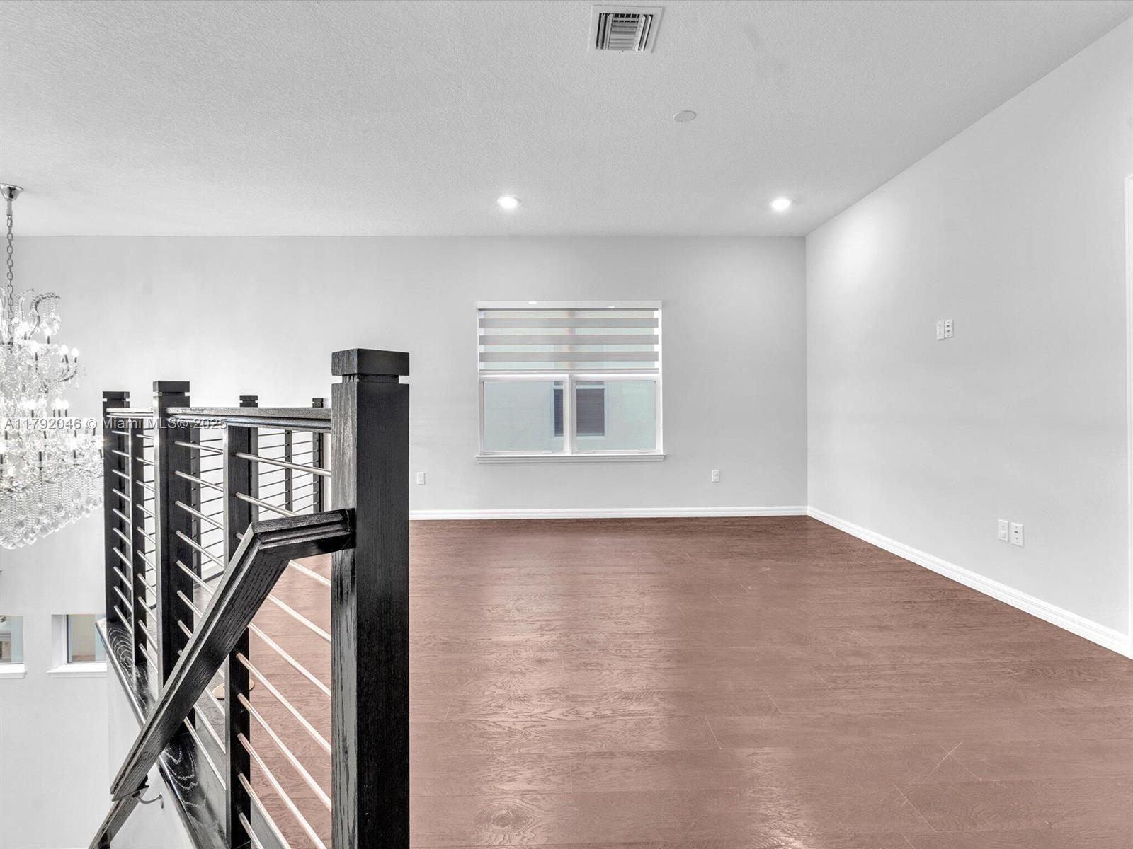 4317 Ficus Street Hollywood, FL 33021 - Photo 9 of 29 a view of an empty room with a window