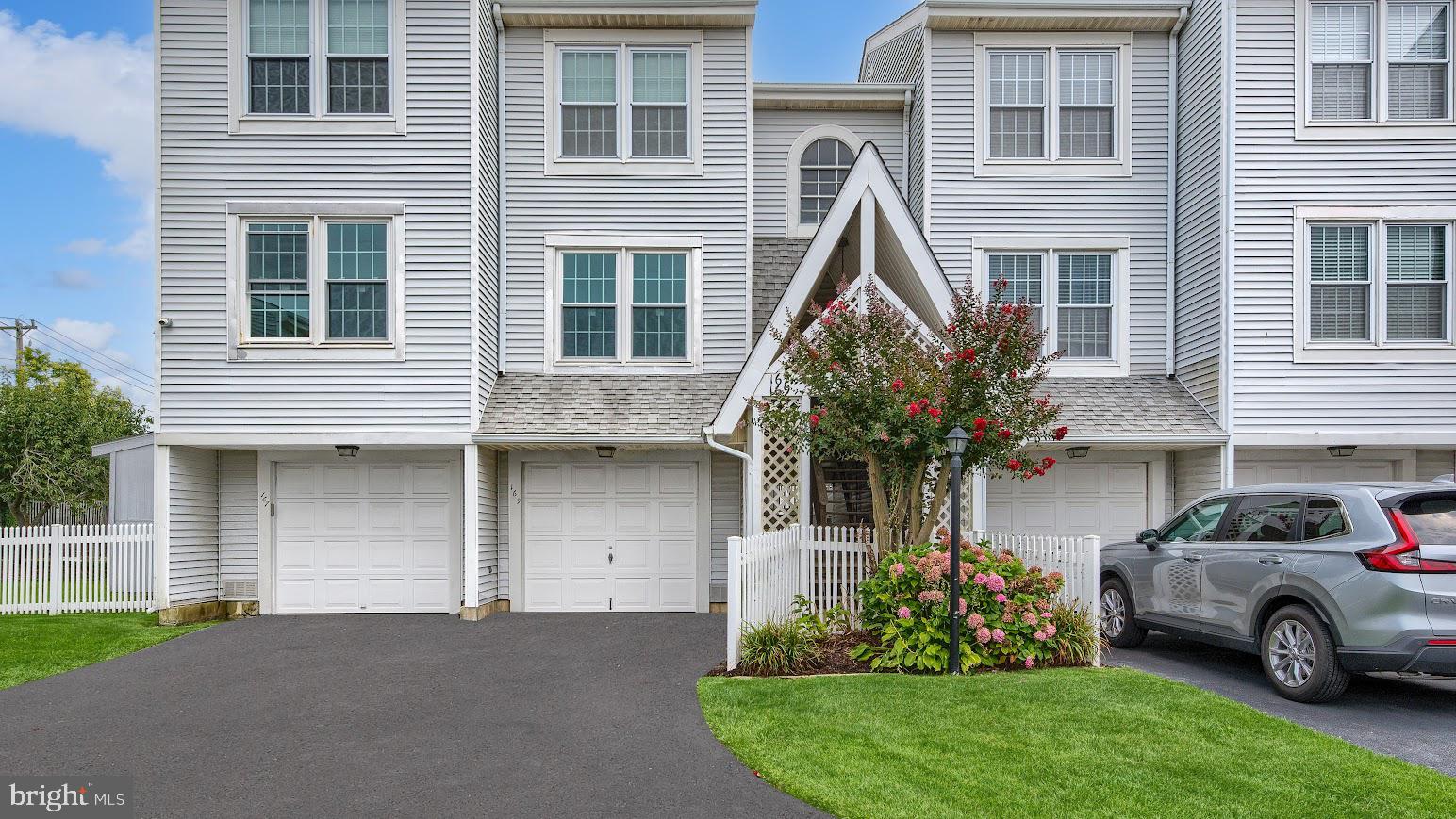167 40th Street South Brigantine, NJ 08203 - Photo 2 of 28 a house view with a garden space
