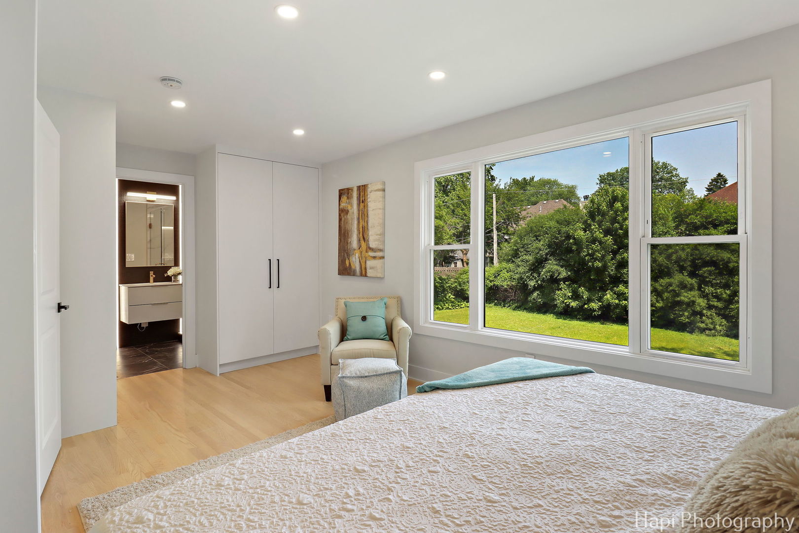 539 South Plum Grove Road Palatine, IL 60067 - Photo 12 of 33 a bedroom with a bed and a large window