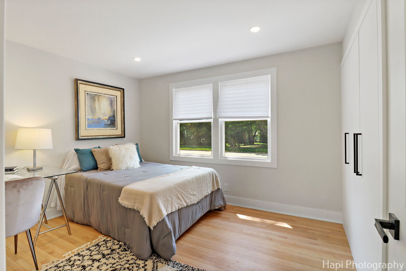 539 South Plum Grove Road Palatine, IL 60067 - Photo 15 of 33 a bedroom with a large bed and a window