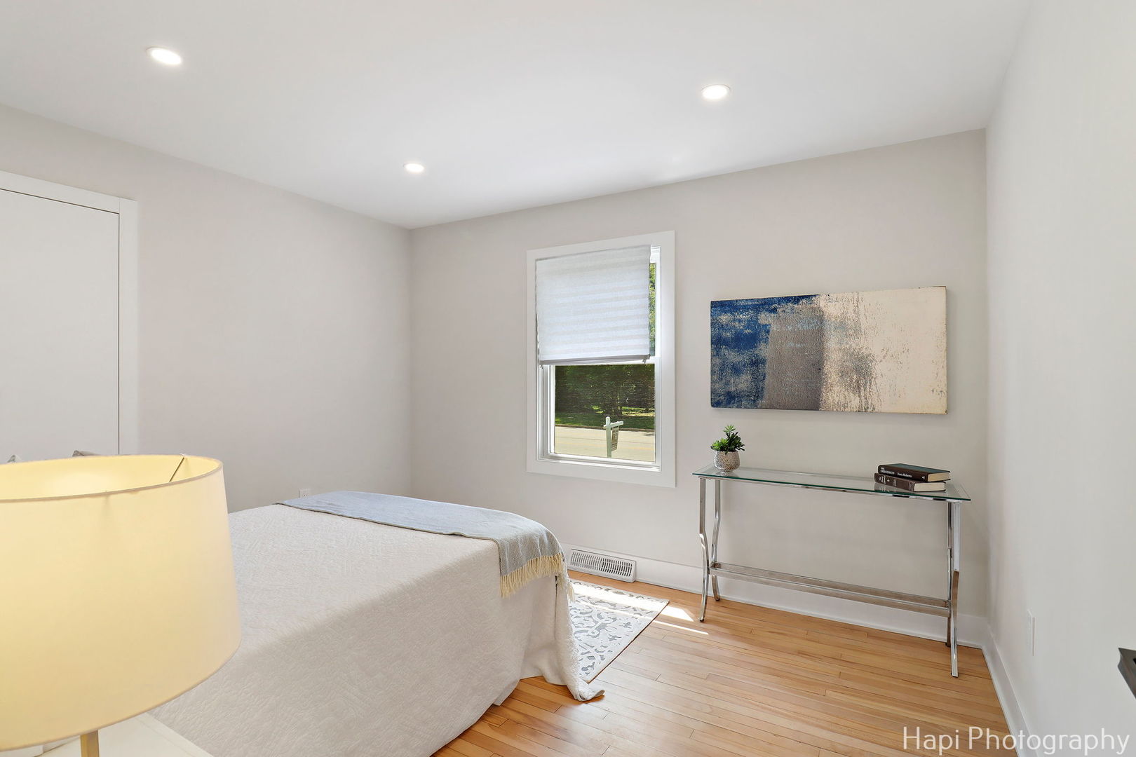 539 South Plum Grove Road Palatine, IL 60067 - Photo 16 of 33 a bedroom with a bed and a flat screen tv
