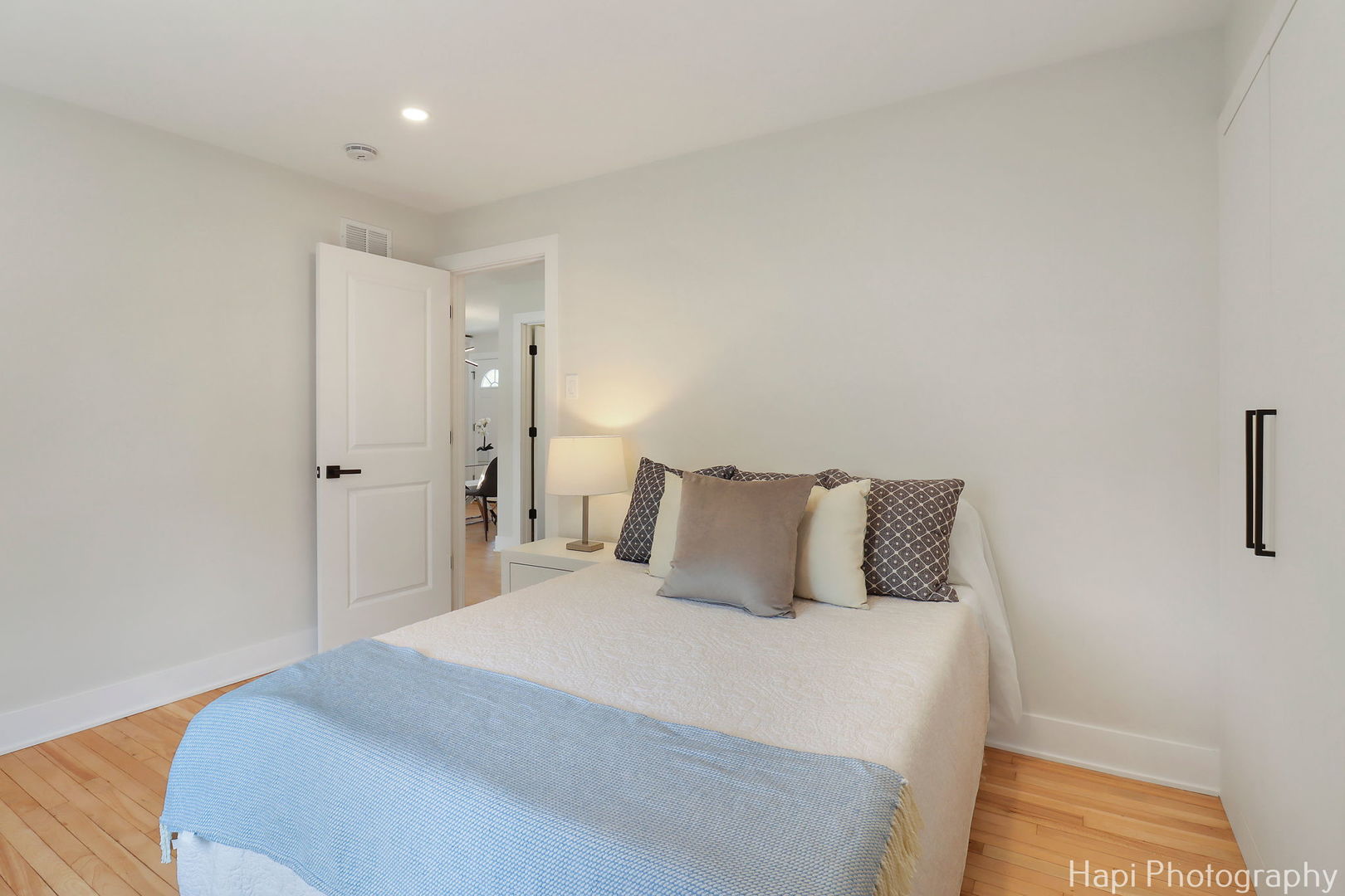 539 South Plum Grove Road Palatine, IL 60067 - Photo 17 of 33 a bedroom with a bed and a night stand