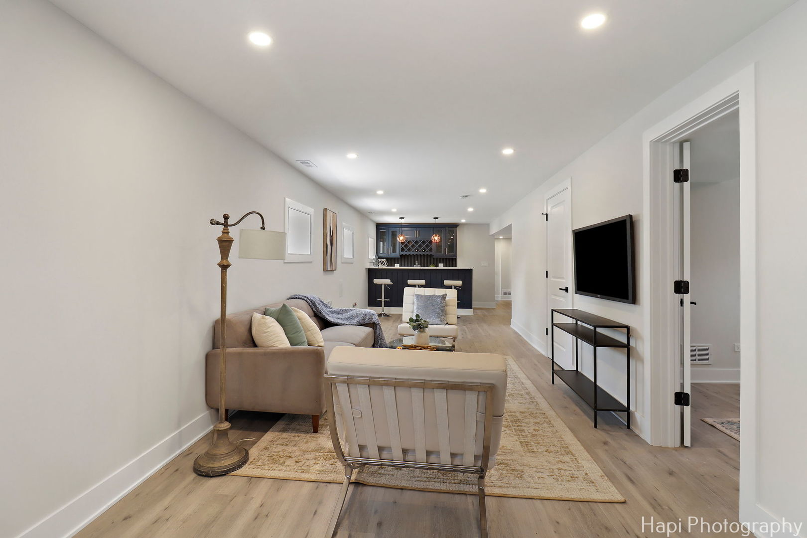 539 South Plum Grove Road Palatine, IL 60067 - Photo 21 of 33 a living room with fireplace furniture and a flat screen tv