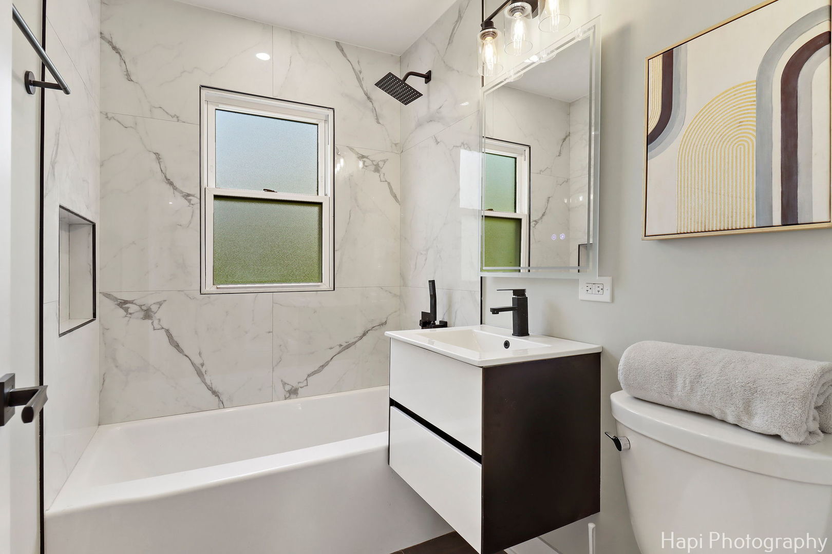 539 South Plum Grove Road Palatine, IL 60067 - Photo 10 of 33 a bathroom with a sink toilet tub and shower
