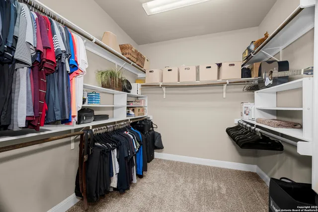 a bathroom with a sink toilet a mirror and shower