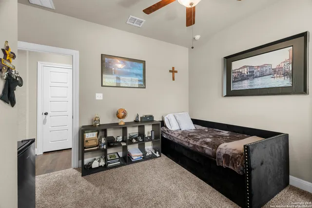 a view of a livingroom with furniture and windows
