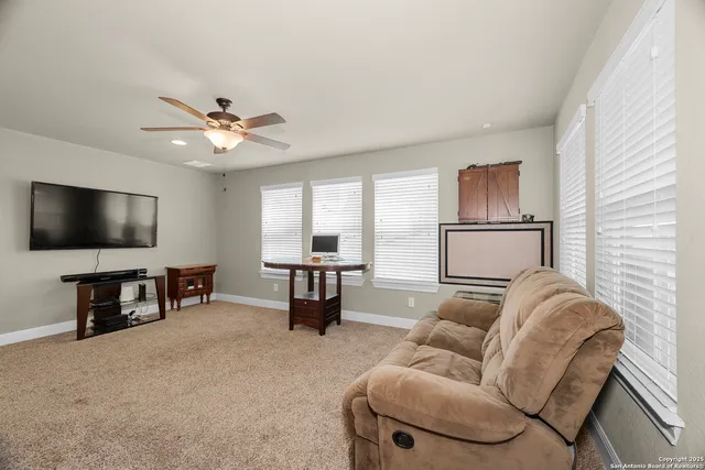 a bathroom with a sink toilet a mirror and shower