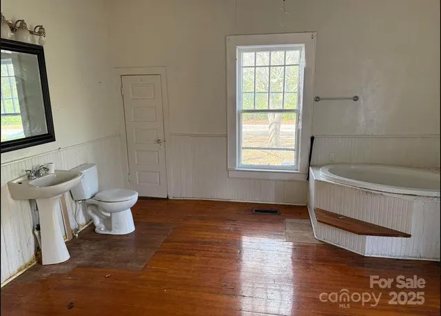 a bathroom with a sink and a toilet