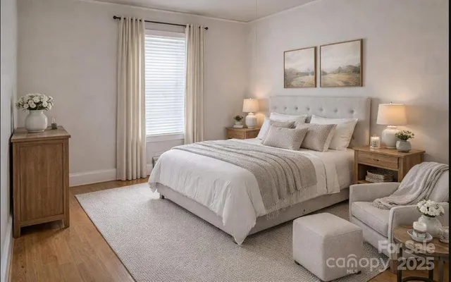 a bedroom with bed and window