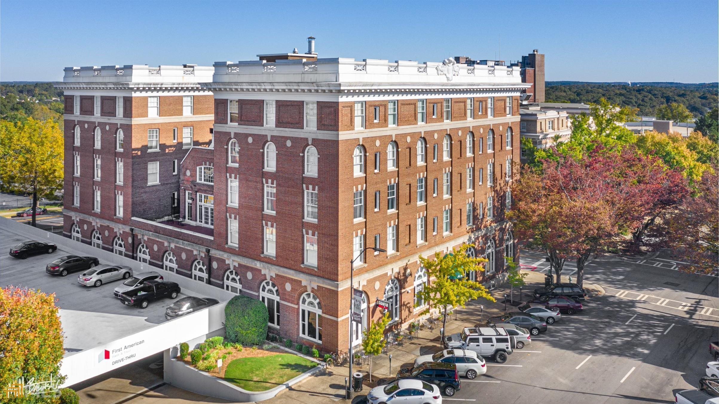 247 East Washington Street, Unit 505 Athens, GA 30601 - Photo 1 of 1 a view of a building with a lot of windows