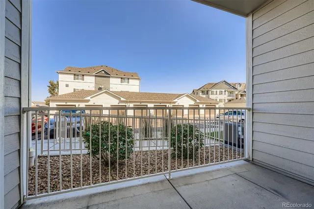a view of a large building from a balcony