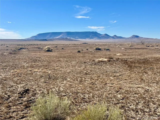 a view of an outdoor space and a mountain view