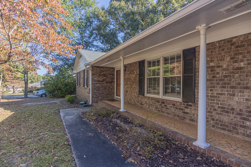 1934 Huntsman Drive Aiken, SC 29803 - Photo 3 of 19 a house with trees in front of it