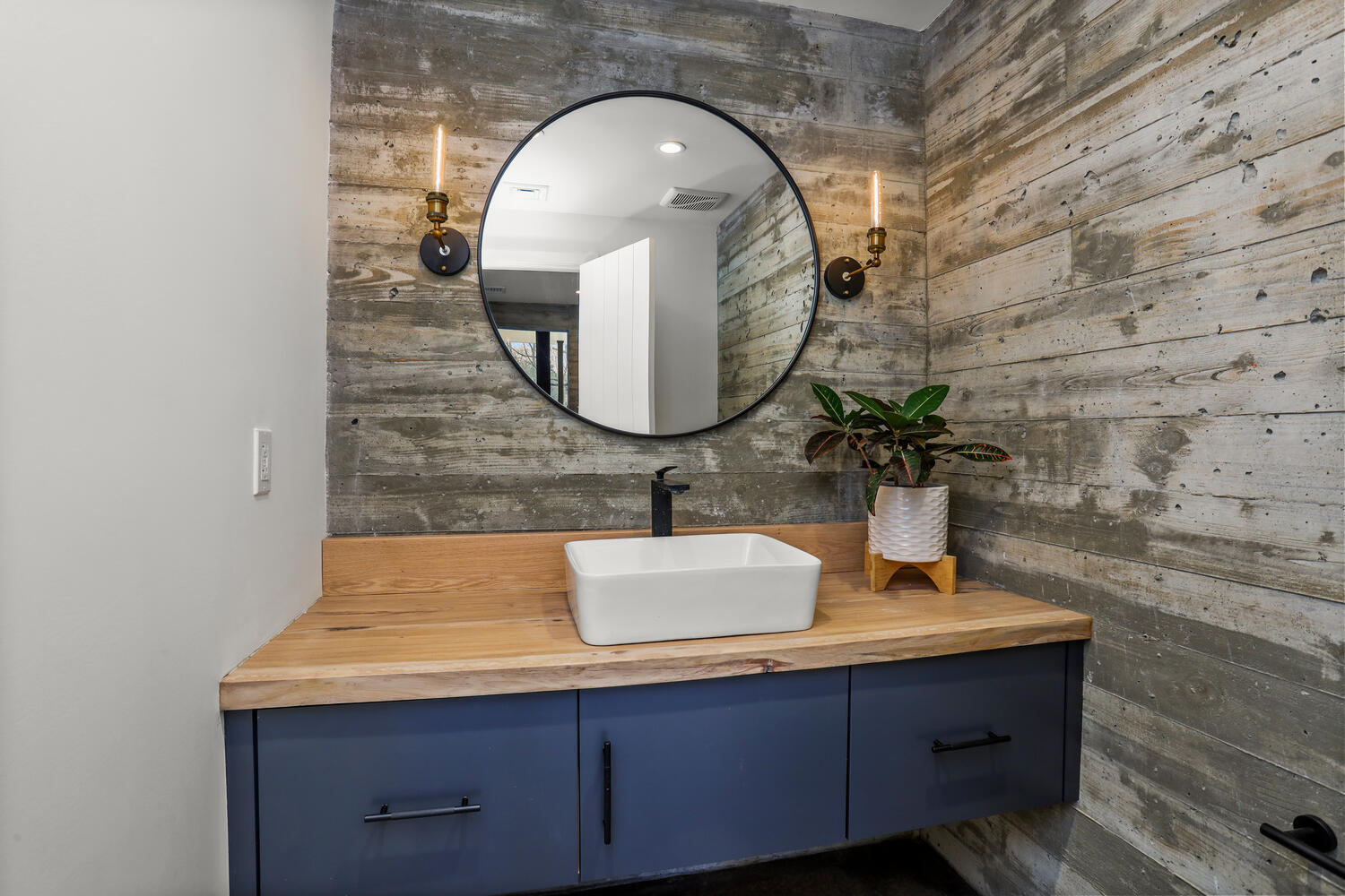 38 Goodwives River Road Darien, CT 06820 - Photo 18 of 58 a bathroom with a sink and a mirror