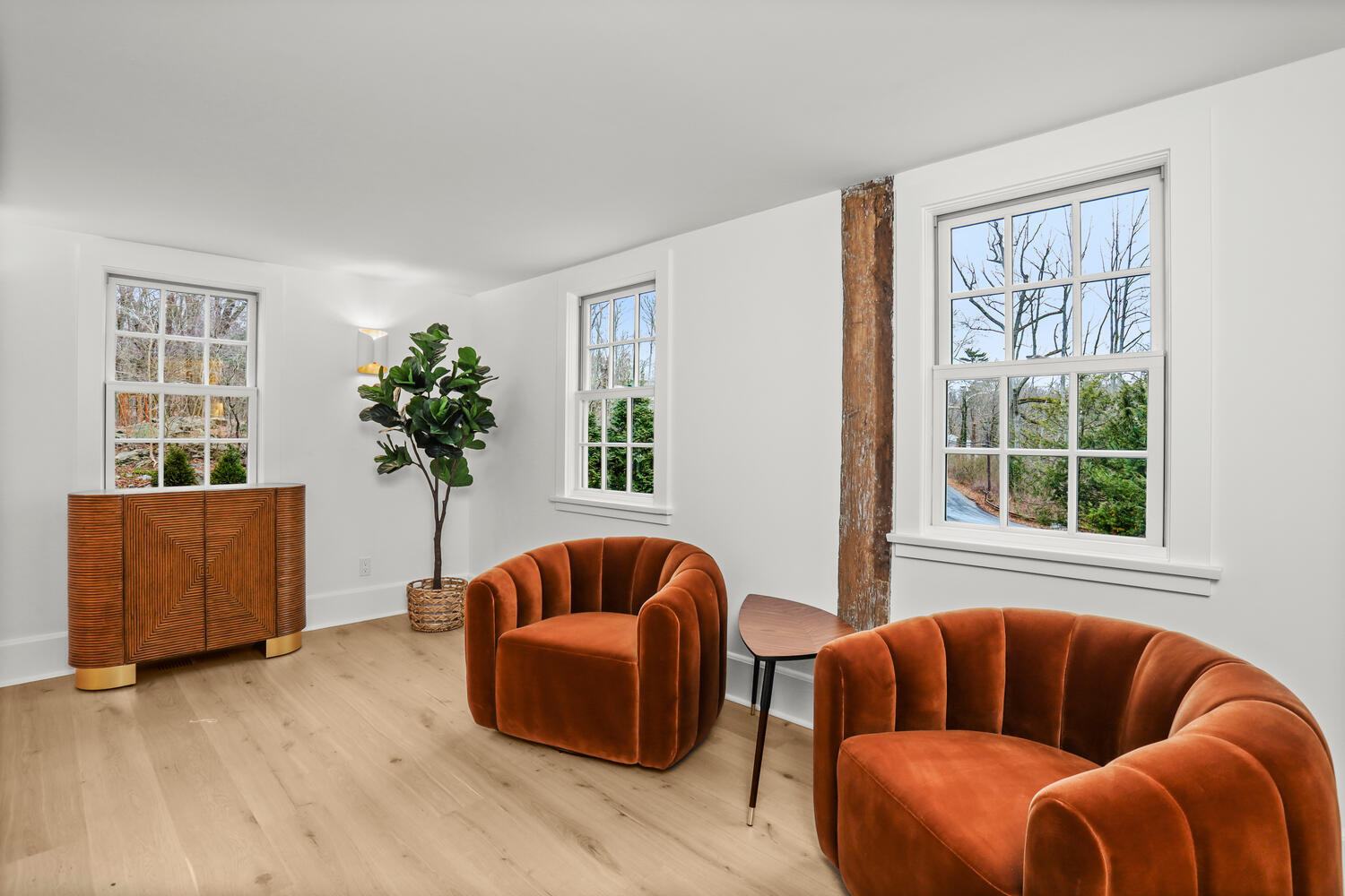 38 Goodwives River Road Darien, CT 06820 - Photo 22 of 58 a living room with furniture and a large window