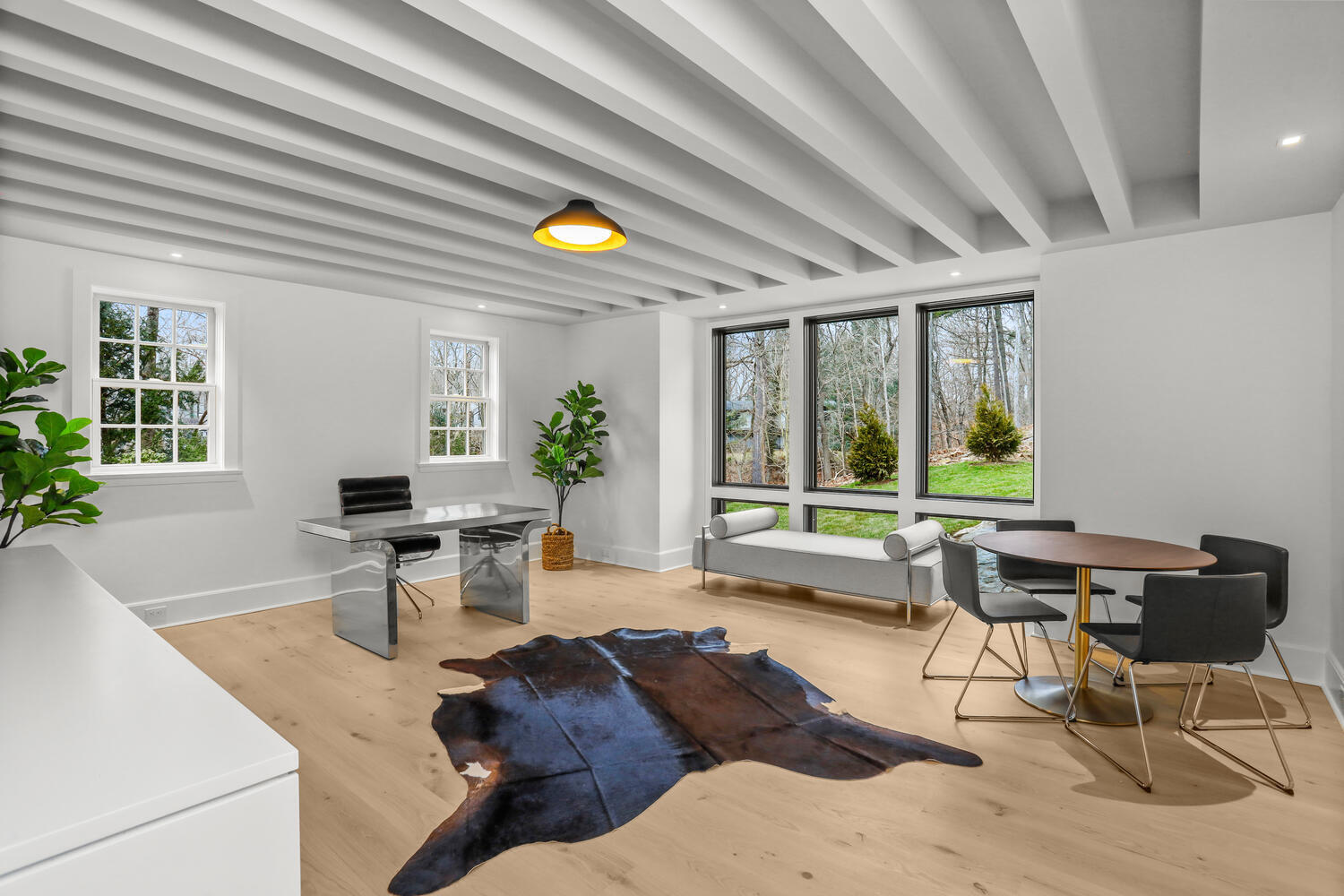 38 Goodwives River Road Darien, CT 06820 - Photo 23 of 58 a living room with furniture and a large window