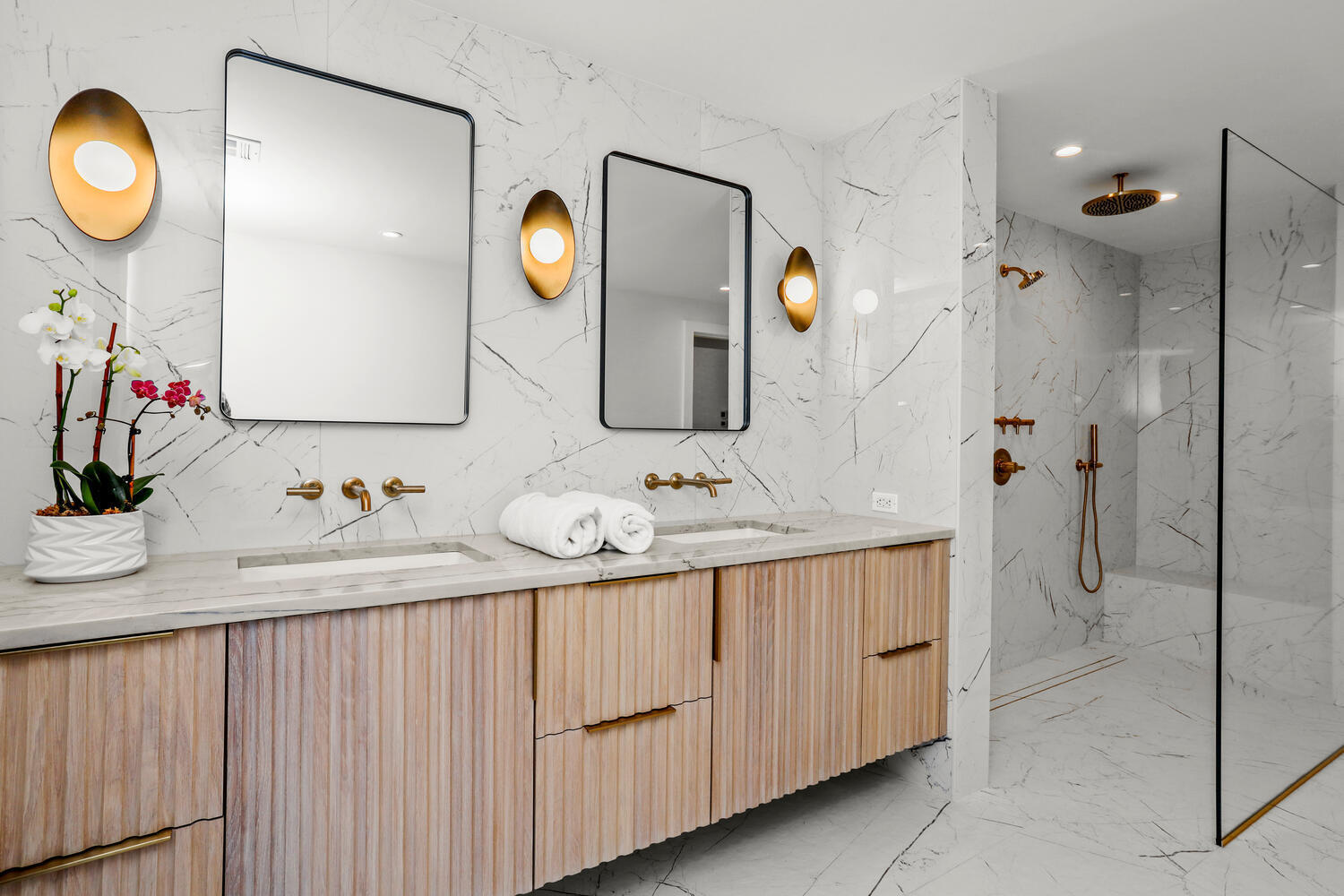 38 Goodwives River Road Darien, CT 06820 - Photo 30 of 58 a bathroom with a sink and a mirror