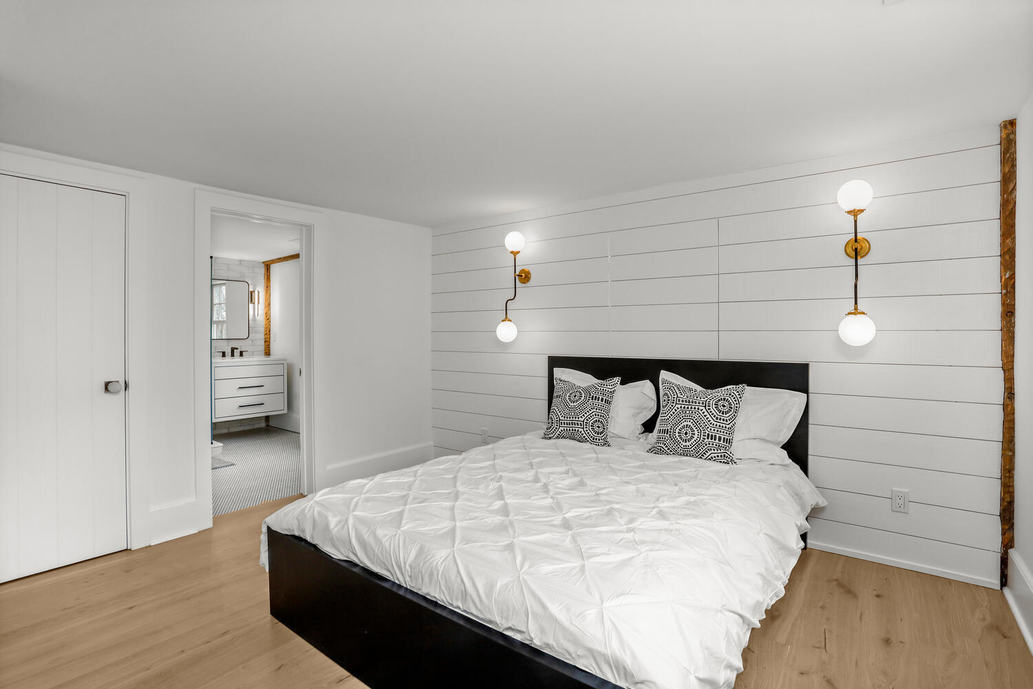 38 Goodwives River Road Darien, CT 06820 - Photo 34 of 58 a bedroom with a bed and mirror