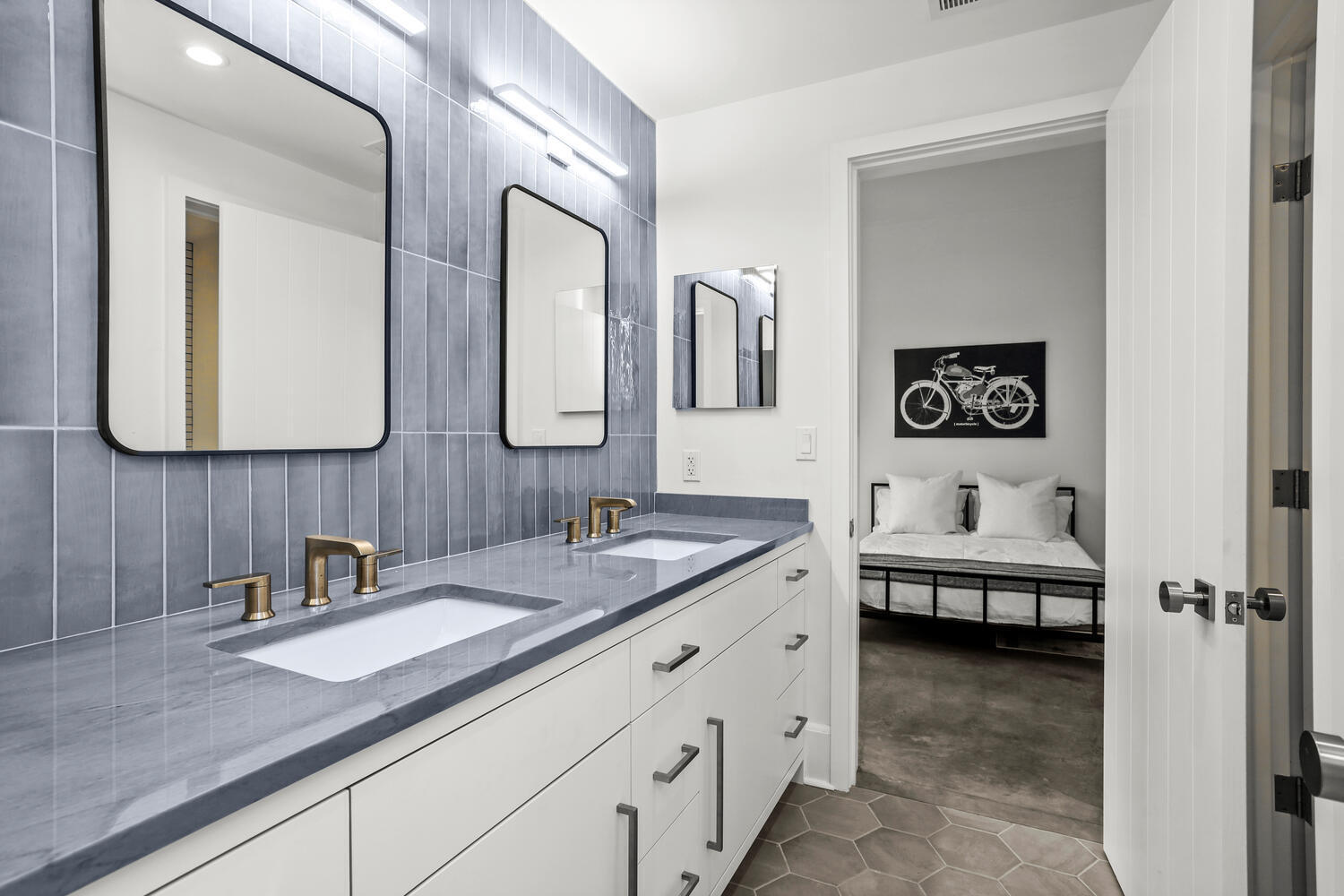 38 Goodwives River Road Darien, CT 06820 - Photo 41 of 58 a en suite bathroom with a granite countertop sink and a mirror