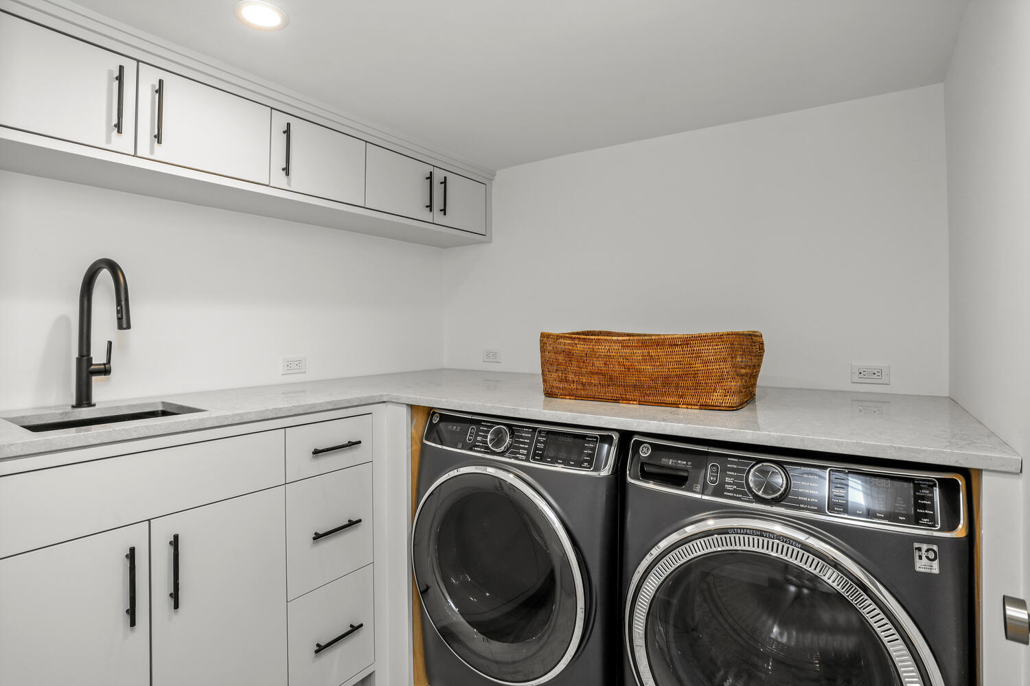 38 Goodwives River Road Darien, CT 06820 - Photo 49 of 58 a utility room with sink dryer and washer