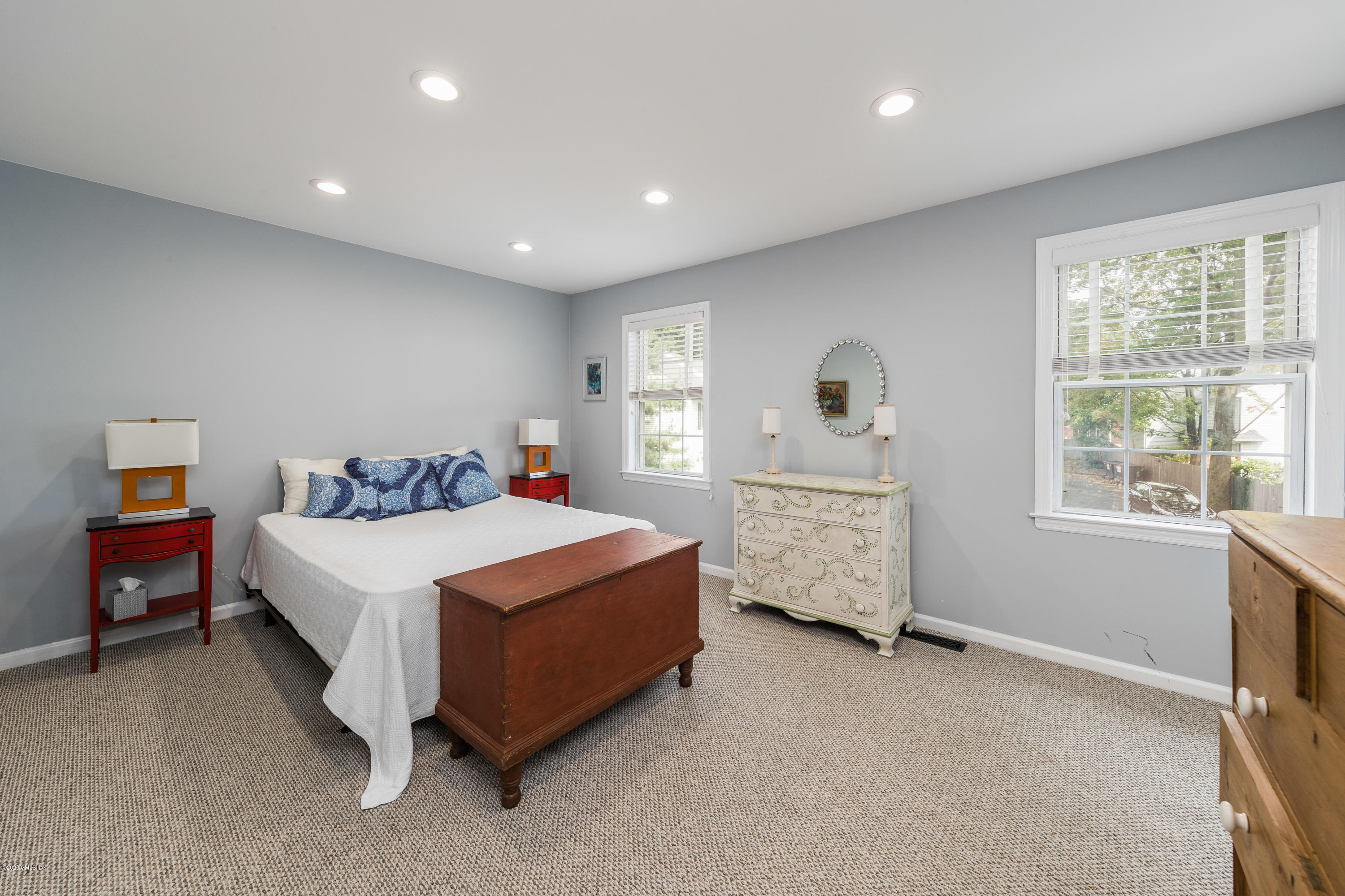 33 Talbot Lane, Unit 20 Greenwich, CT 06830 - Photo 11 of 20 a spacious bedroom with a bed and a window