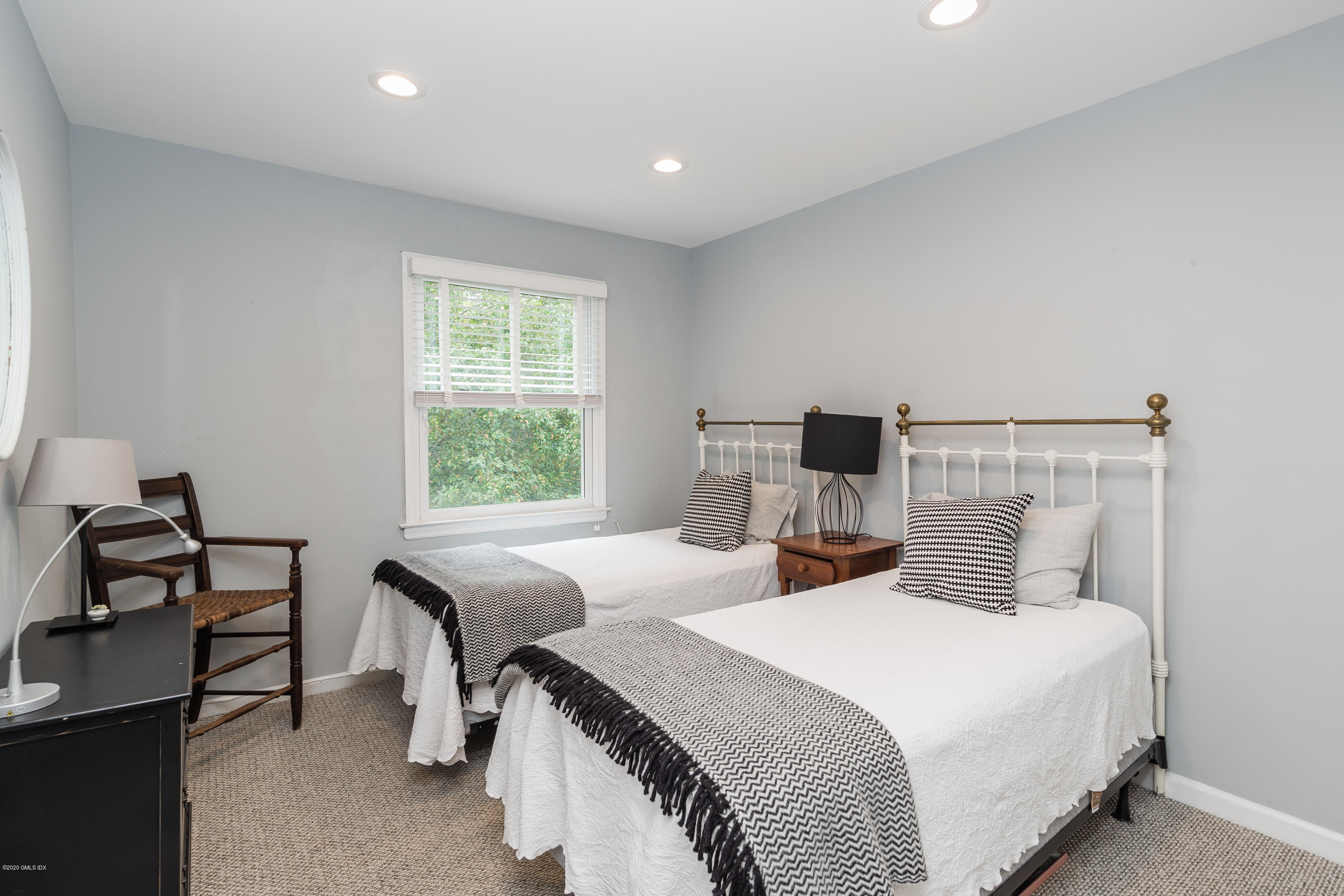 33 Talbot Lane, Unit 20 Greenwich, CT 06830 - Photo 13 of 20 a bedroom with bed and a window