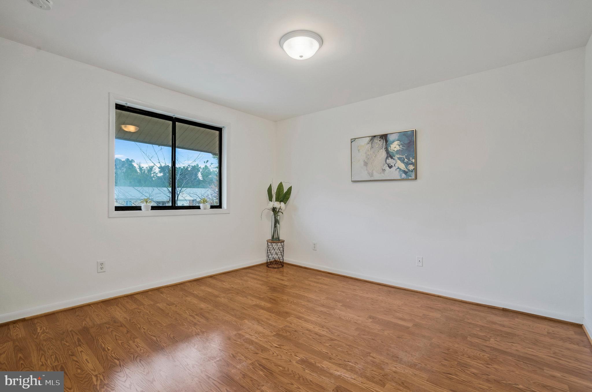 2754 Hollywood Road, Unit 301 Falls Church, VA 22043 - Photo 12 of 35 an empty room with a window