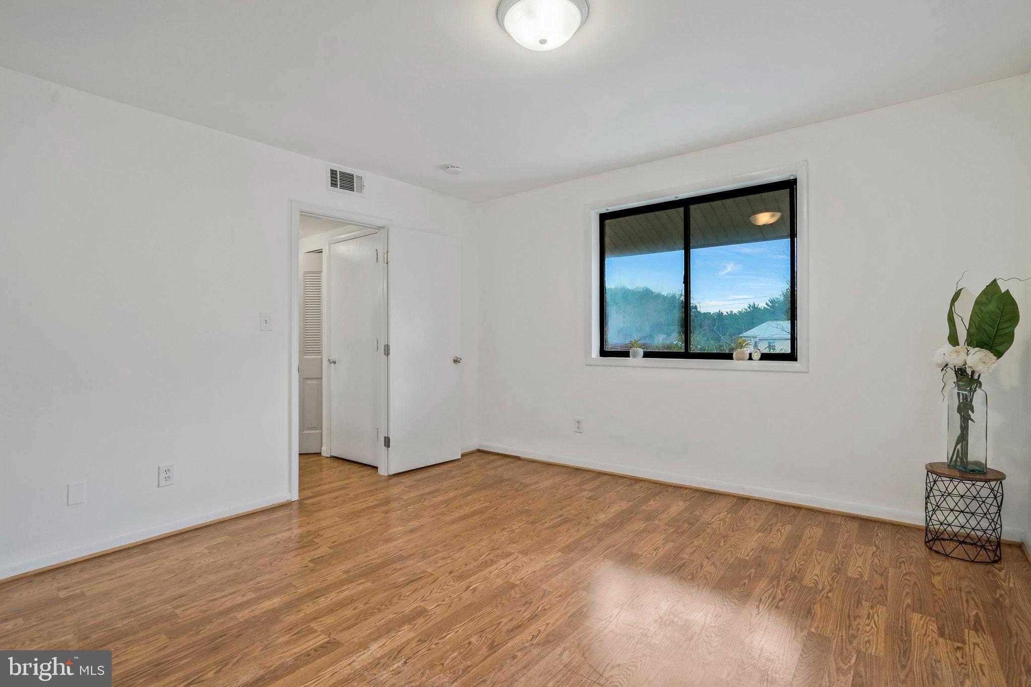2754 Hollywood Road, Unit 301 Falls Church, VA 22043 - Photo 13 of 35 a view of an empty room with a window