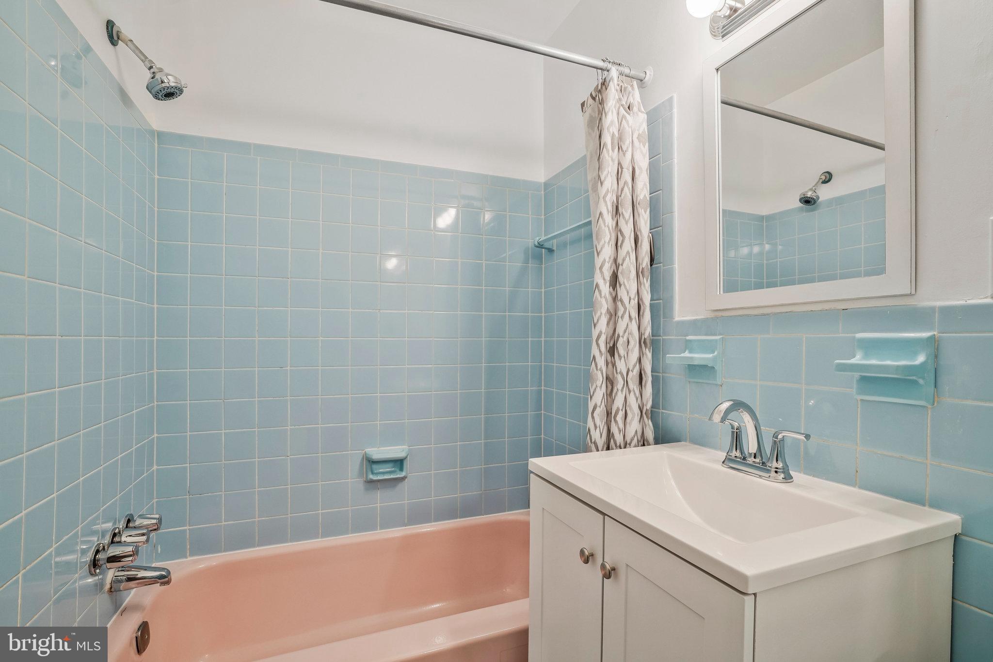 2754 Hollywood Road, Unit 301 Falls Church, VA 22043 - Photo 17 of 35 a bathroom with a sink and a mirror