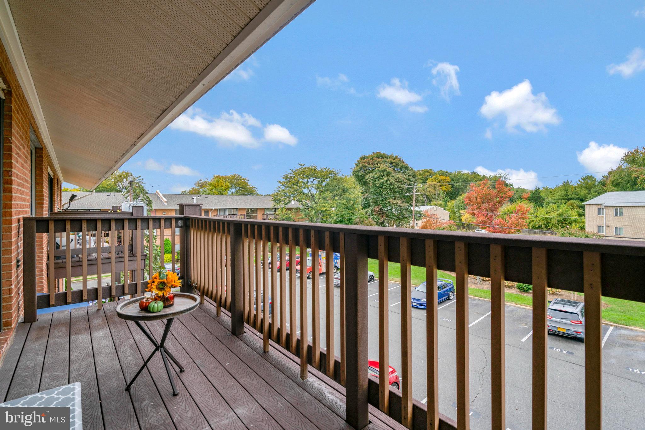 2754 Hollywood Road, Unit 301 Falls Church, VA 22043 - Photo 25 of 35 a view of a balcony with wooden floor