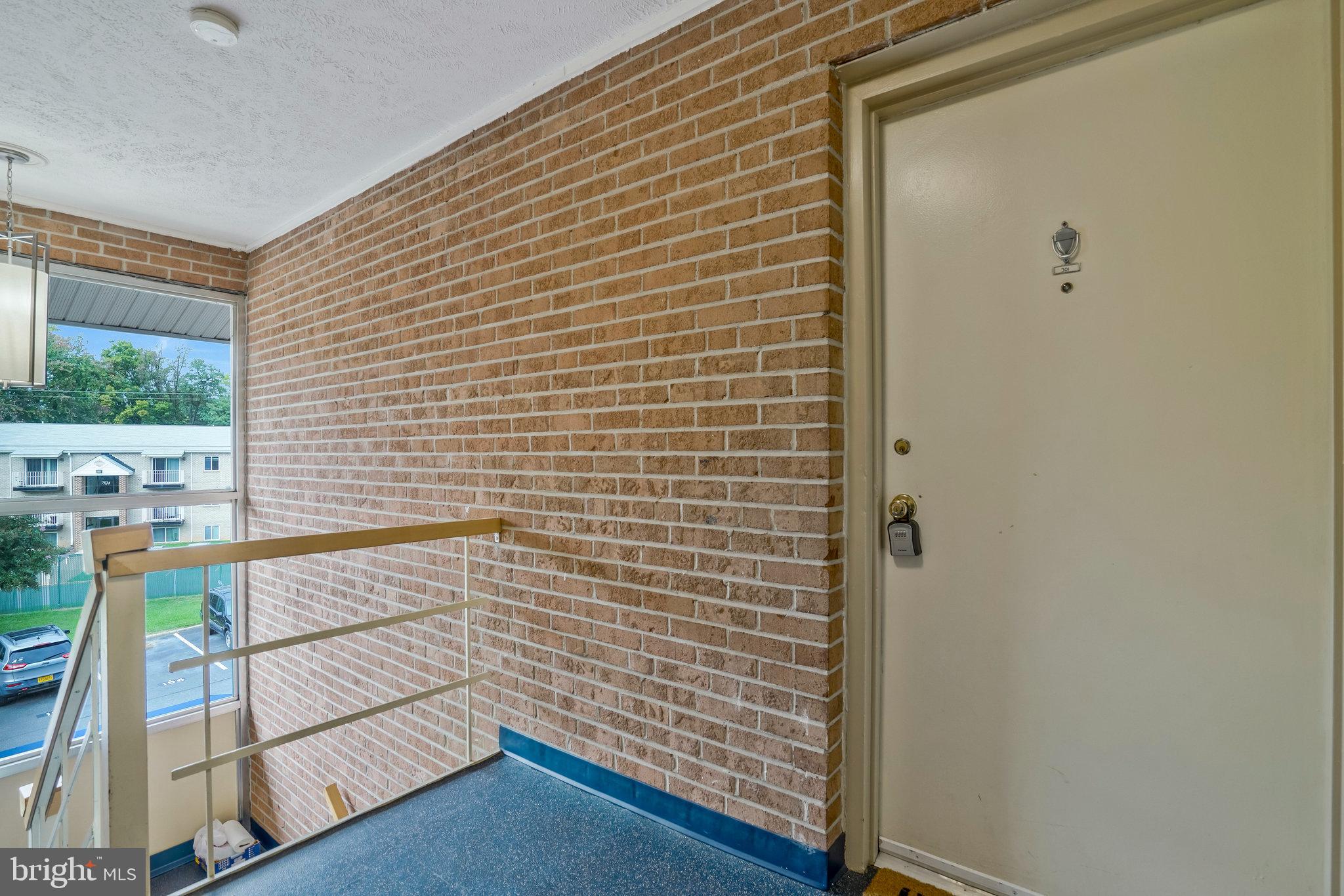 2754 Hollywood Road, Unit 301 Falls Church, VA 22043 - Photo 29 of 35 a view of balcony with wooden floor