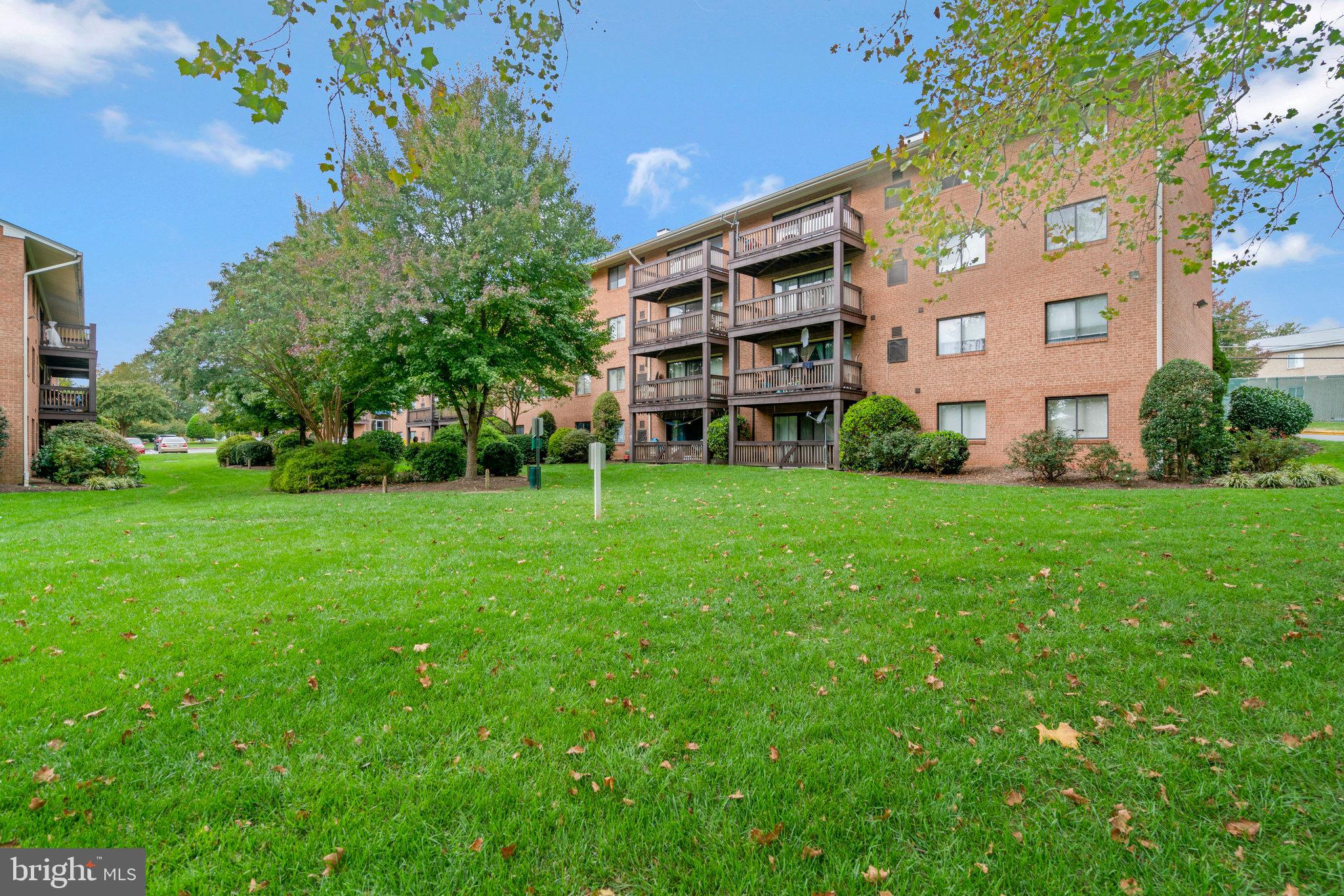 2754 Hollywood Road, Unit 301 Falls Church, VA 22043 - Photo 35 of 35 a view of a building with a yard