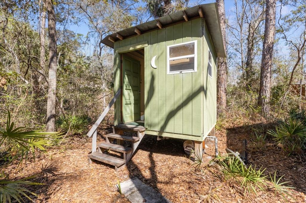 86 Southwest Turtle Pass Road Chiefland, FL 32626 - Photo 15 of 37 a house with trees in front of it