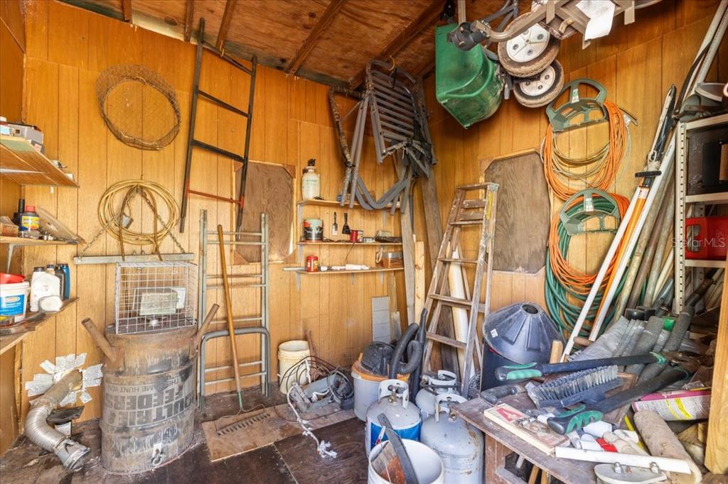 86 Southwest Turtle Pass Road Chiefland, FL 32626 - Photo 18 of 37 a painting on a wall next to a building