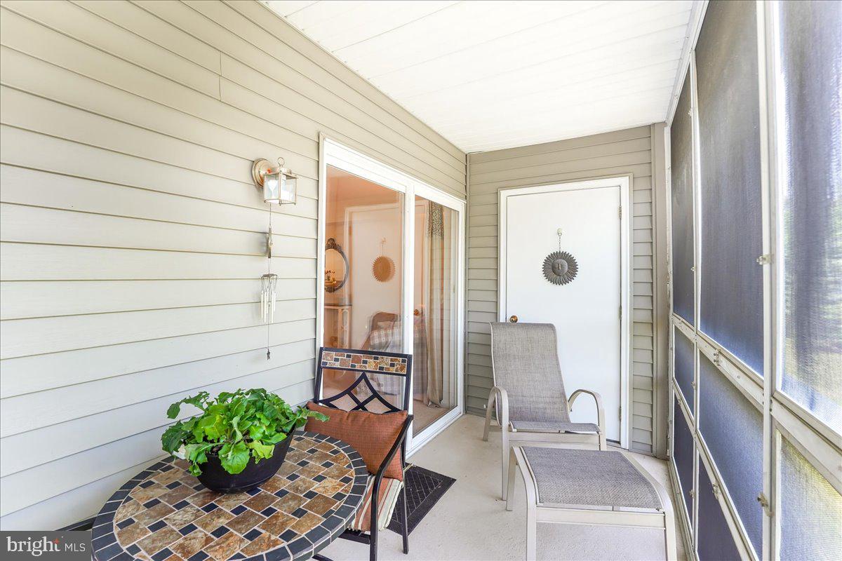 644 Brandon Road Eagleville, PA 19403 - Photo 8 of 31 Screened Patio with Storage Closet