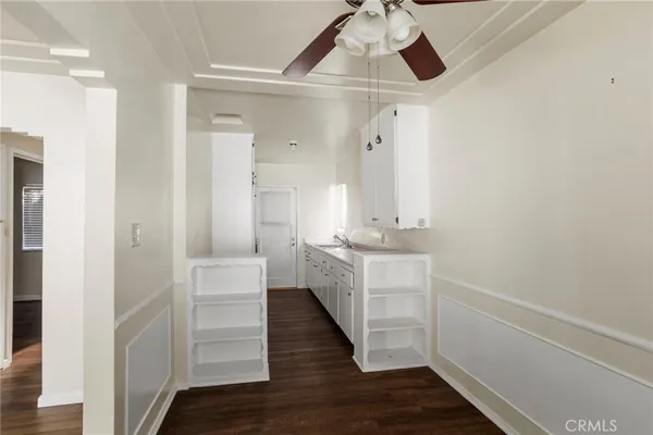 a bathroom with a sink a mirror and a shower