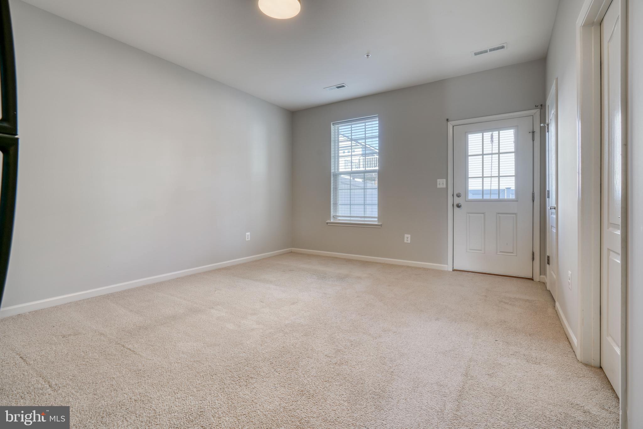 985 Morgan Run Road Middle River, MD 21220 - Photo 15 of 33 an empty room with windows