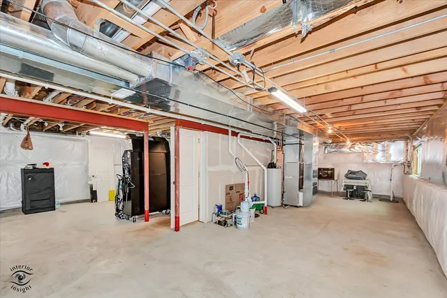 a view of a hallway with seating space